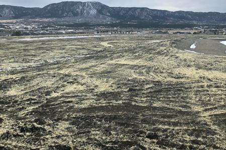 Seed and straw crimp the new vegetation in Monument, Colorado