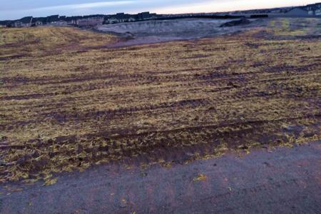 Erosion Control Monument, Colorado. Seed and straw crimp the disturbed area for germination and to stabilize the soil.