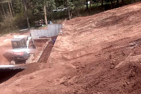 Excavating in Larkspur, Colorado. Backfilling a detached garage in Larkspur, Colorado