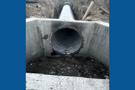 Culvert install in Colorado Springs for a parking lot drain