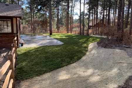Re-graded the back yard, removed some trees, added some fence, added a sprinkler system, installed sod and erosion blanket at this house in Monument, Colorado