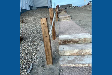 Commercial landscape in Monument, Colorado and designed a set of stairs for homeowners to access their mailbox through the open space lot