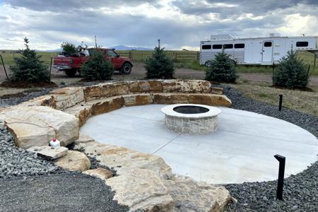 Landscaping in Black Forest, Colorado. Built a wood burning fire pit with stadium seating Siloam Stone retaining wall rock, Veneer stone to match the home. Landscape rocks, flagstone walkaway and outdoor lighting to sit by a warm fire, watch the stars and see Pike Peak.